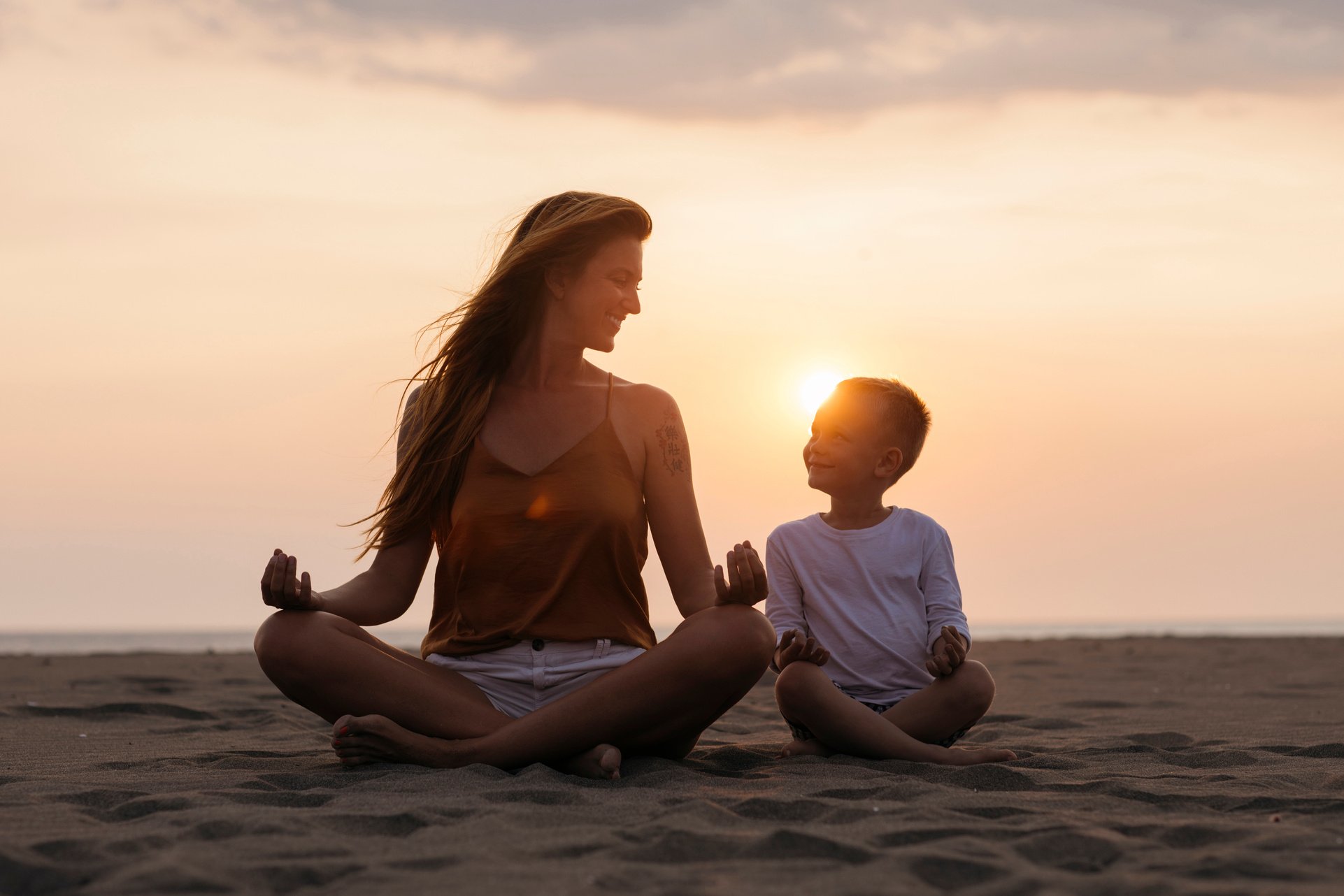 Mom and son doing yoga